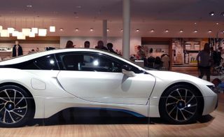 BMW electric vernacular. The futuristic door structure car