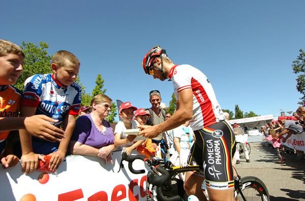 Race leader Tom Boonen (Omega Pharma-QuickStep) signs autographs before stage 5 at the Eneco Tour.