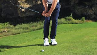 Golf coach Peter Finch shows has the wrists have become too involved in chipping