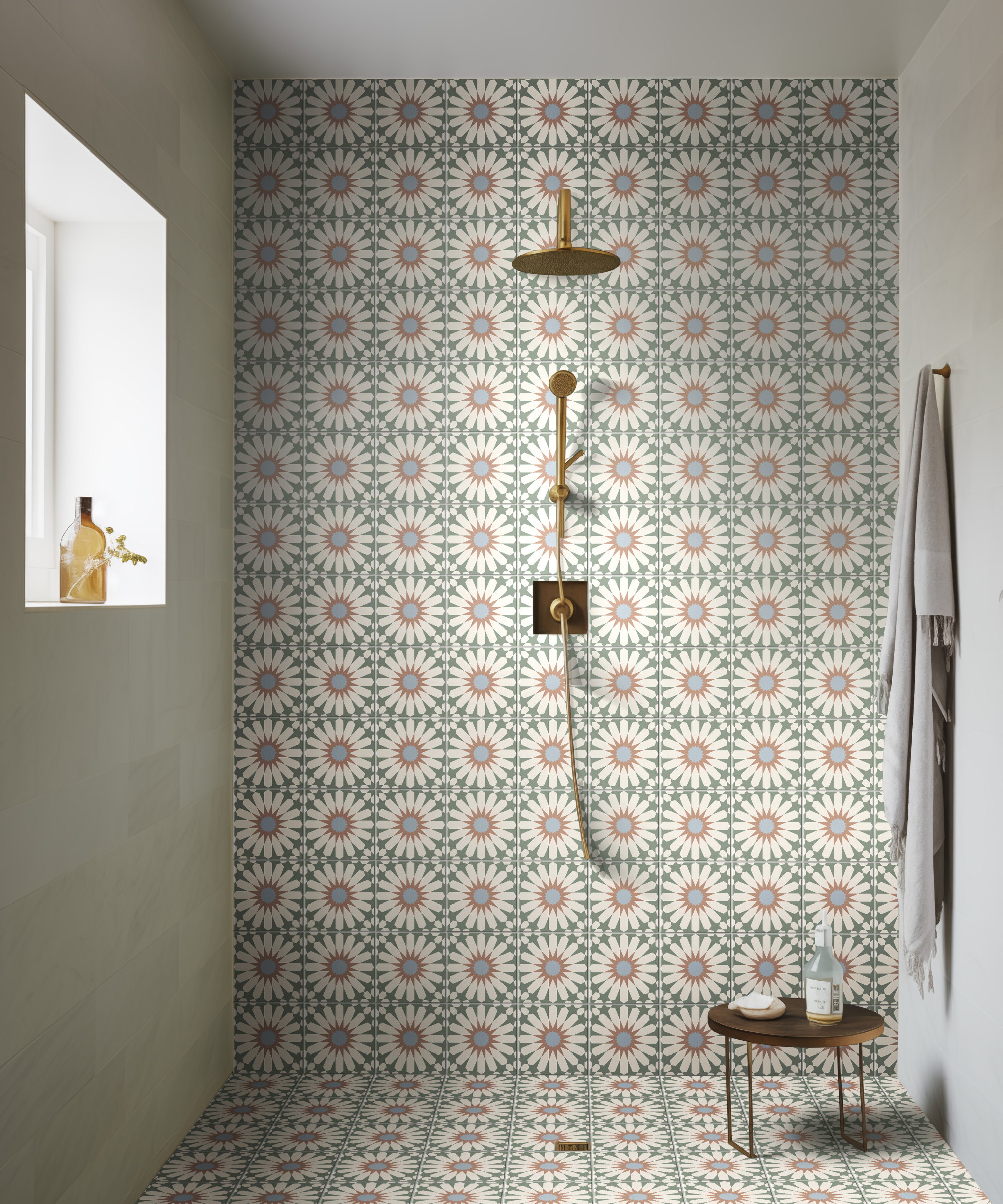 wet room with pastel patterned tiles and painted wall
