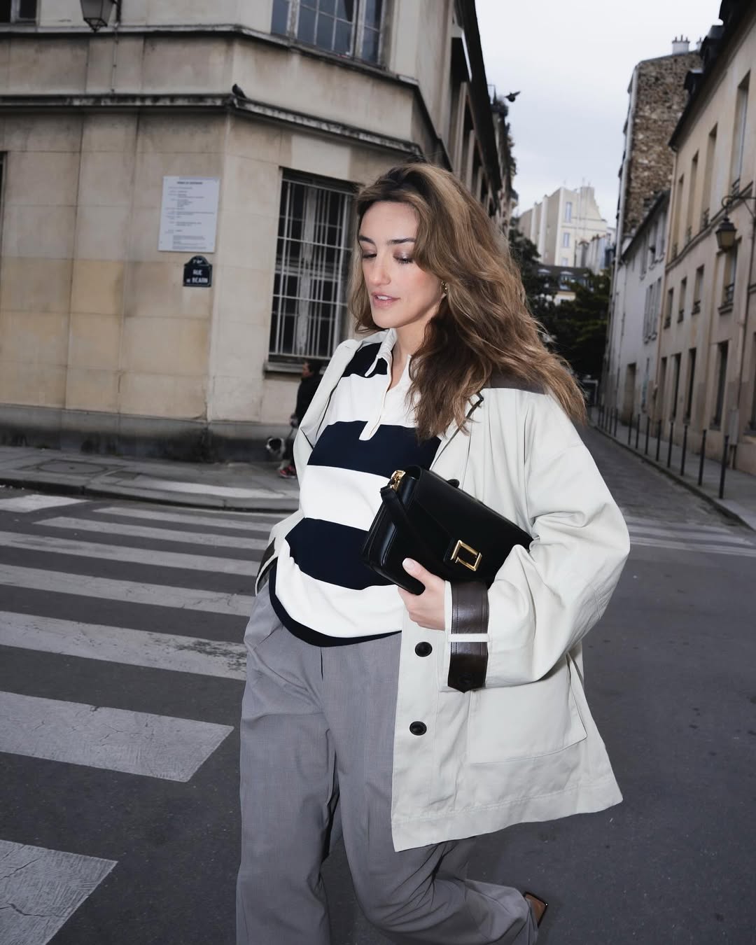 Kenza in beige, navy and grey outfit