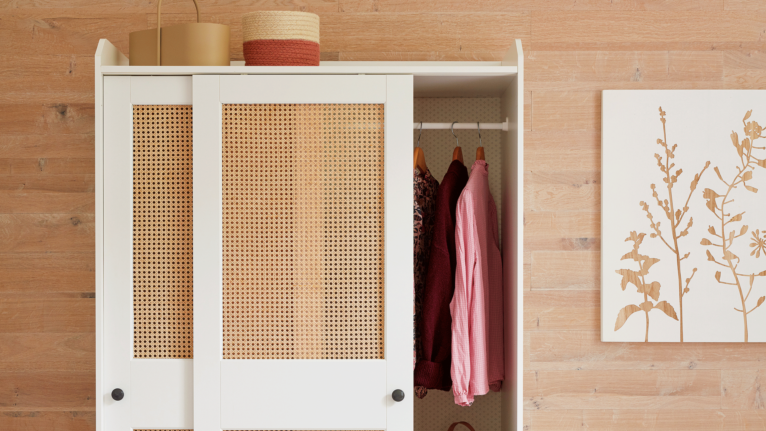 Cane sliding wardrobe with white trim