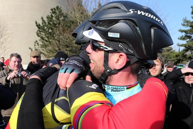 A warm embrace between Omega Pharma-QuickStep teammates Tom Boonen and Mark Cavendish following Cavendish's stage victory.