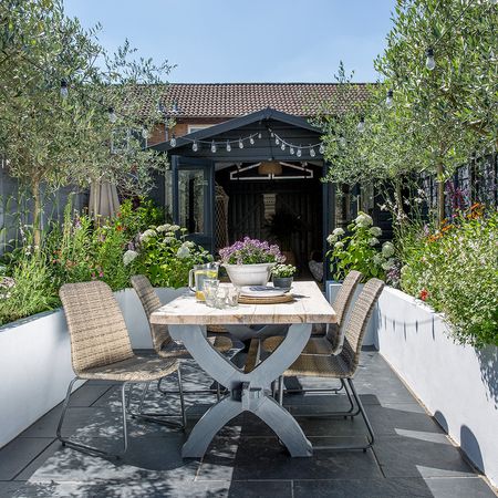 garden area with table and flowers