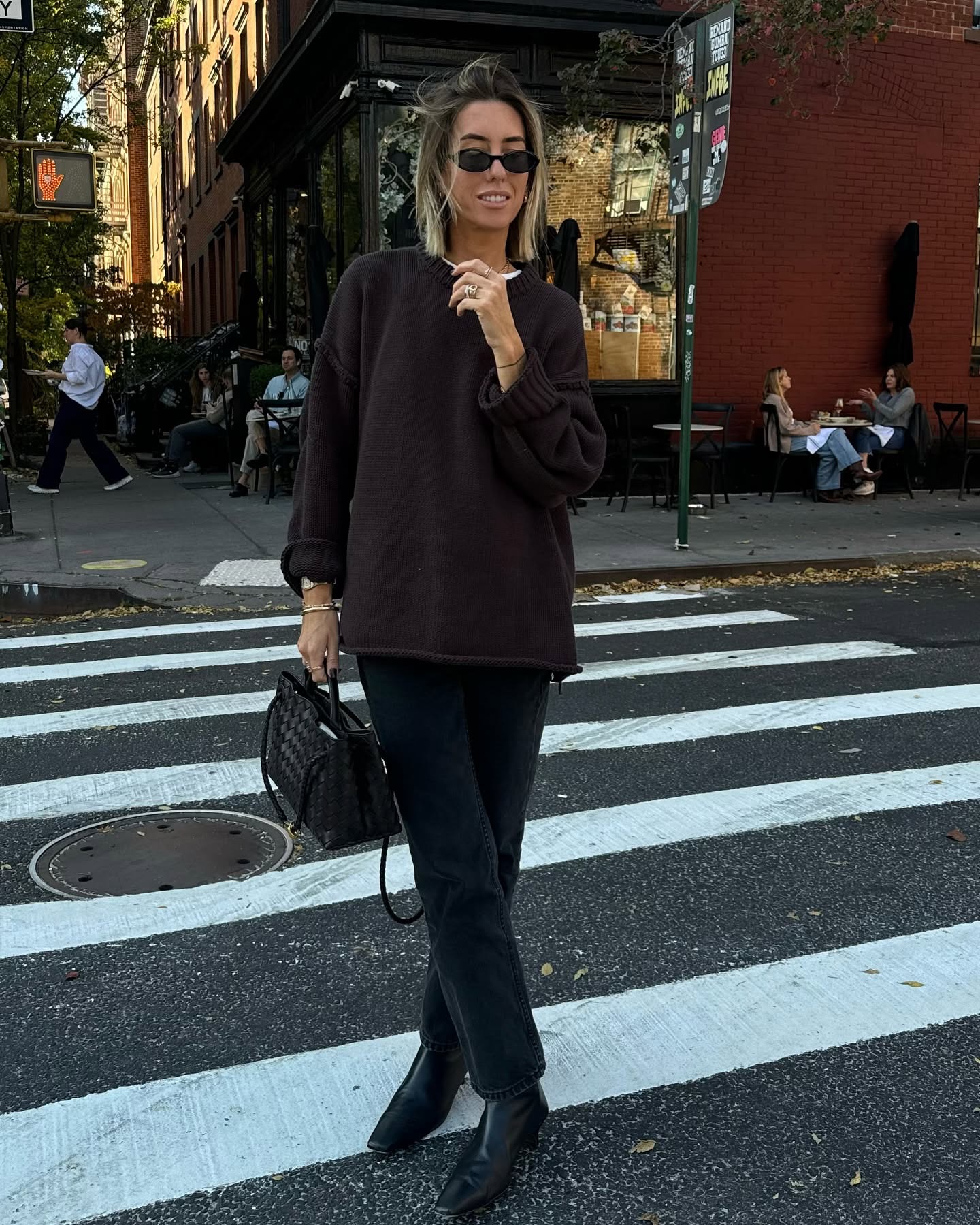 Stylish women wearing black and brown outfits