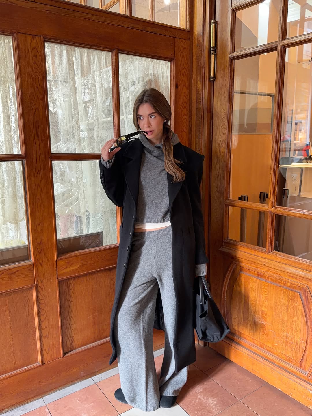 woman wearing winter sweater trend 2025