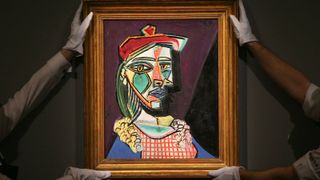 A Picasso painting on a wall