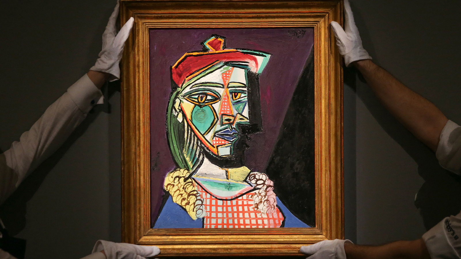 A Picasso painting on a wall