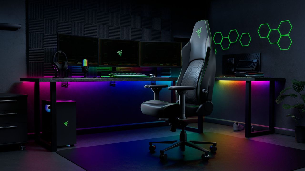 Razer Iskur V2 NewGen gaming chair (black with green highlight) on a black background with rgb highlights
