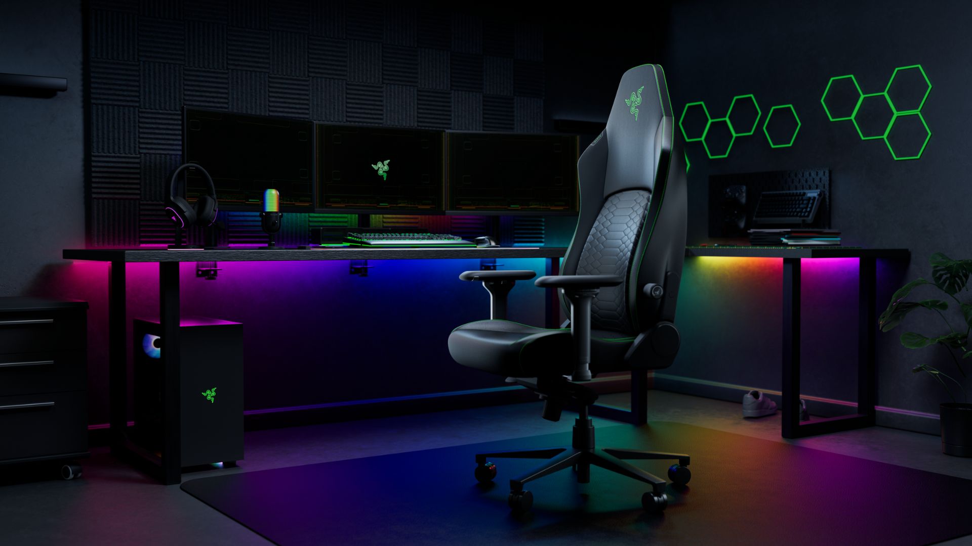 Razer Iskur V2 NewGen gaming chair (black with green highlight) on a black background with rgb highlights