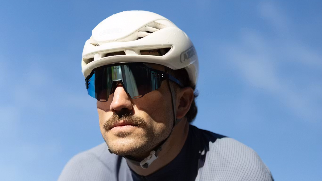 Man wearing SunGod Vulcans Vent Photochromatic Sunglasses