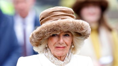 Queen Camilla's regal bright white coat