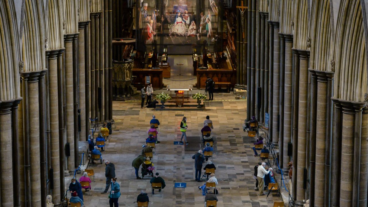 People wait to be vaccinated at Salisbury Cathedral