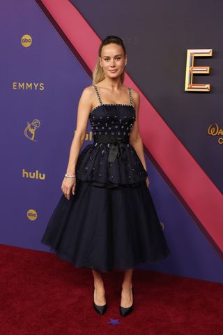 Brie Larson wears a custom Chanel dress based on archival designs from '50s and '60s.