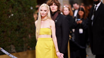 Anya Taylor-Joy and Malcolm McRae attend the 80th Annual Golden Globe Awards at The Beverly Hilton on January 10, 2023 in Beverly Hills, California.