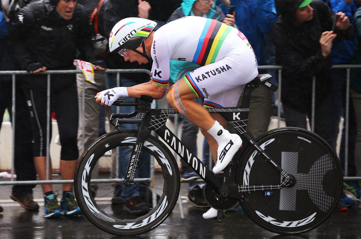 Tony Martin riding through the Dusseldorf rain