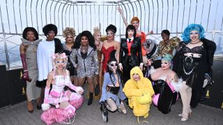 The cast of Ru Paul's Drag Race season 16 pose atop the Empire State Building
