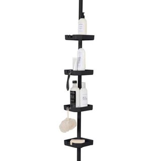 A black pole shower caddy is full of shower items