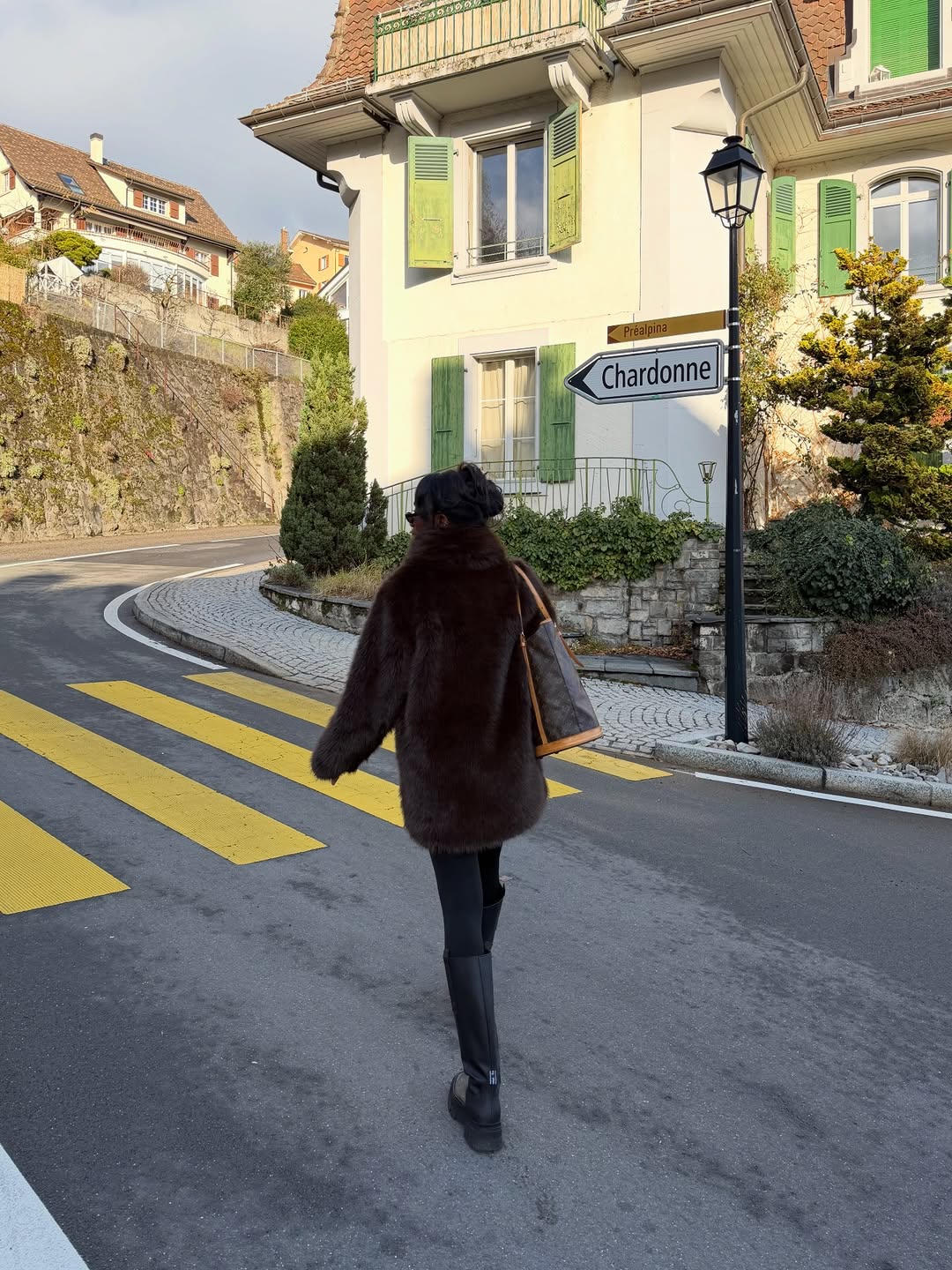 woman wearing leggings with boots outfit 2026