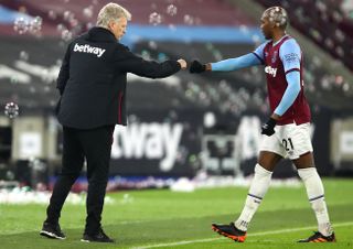 West Ham United manager David Moyes (left) and Angelo Ogbonna celebrate victory after the final whistle during the Premier League match at the London Stadium, London.