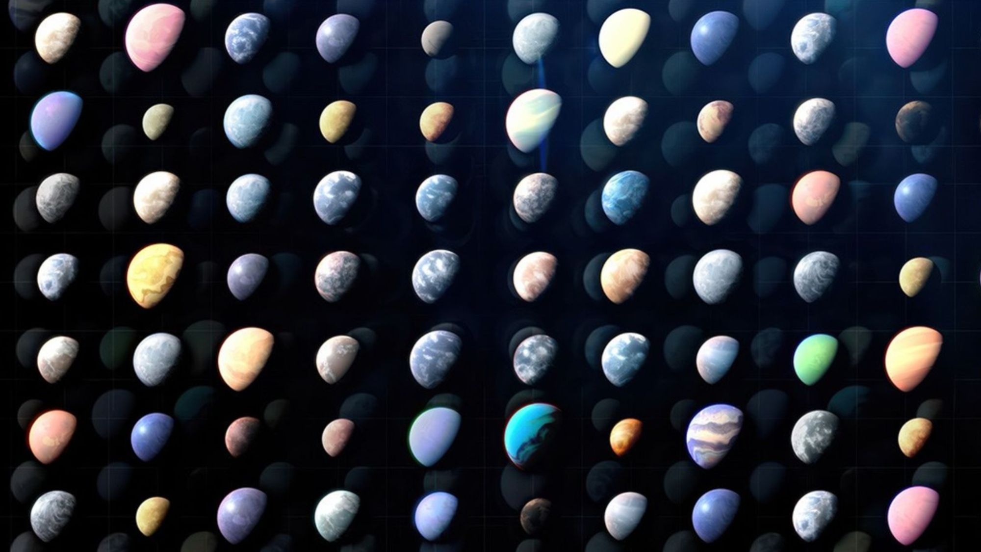 Rows of colorful planets of all colors and sizes over a dark background