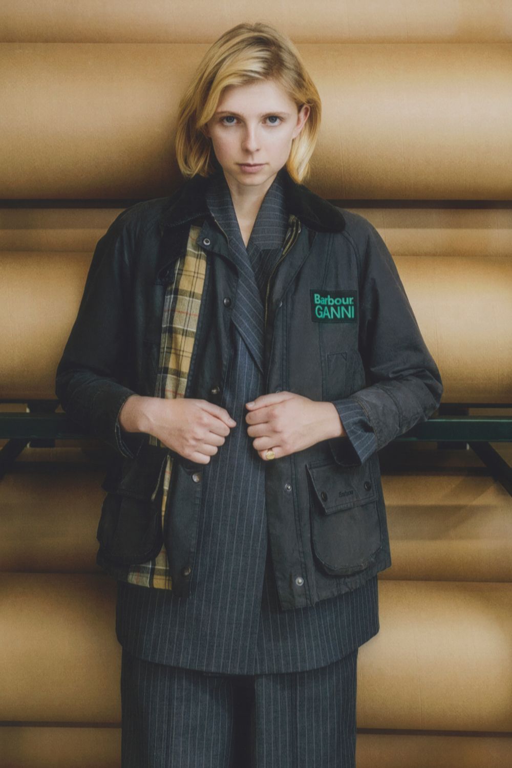 Model wears Ganni x Barbour jacket
