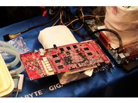 Refitting the display card for overclocking enhancement.
