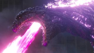 A scene from the movie Shin Godzilla (2016). Here we see a close up of Shin Godzilla, a giant lizard monster, roaring a massive pinky-red energy beam from it's mouth.
