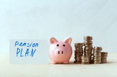 Piggy bank next to coins and sign saying Pension Plan
