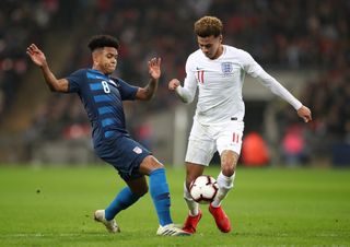 Weston McKennie, left, made his national team debut for the USA as a teenager