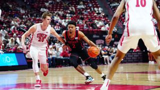 The San Diego State Aztecs' Nick Boyd dribbling the ball against the UNLV Rebels