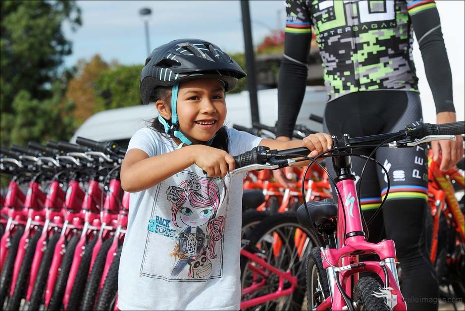 A very happy kid getting to ride with Peter Sagan