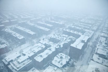 A snowstorm blankets Boston.