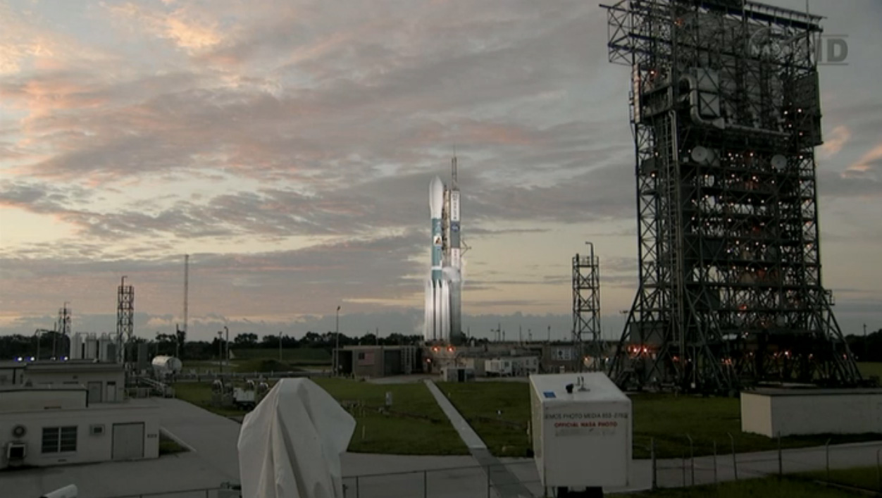 Dawn breaks over Florida&#039;s Cape Canaveral Air Force Station as an unmanned Delta 2 rocket stands poised to launch NASA&#039;s twin Grail lunar gravity probes toward the moon on Sept. 8, 2011. 