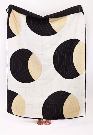 Mid century modern quilted throw blanket from Anthropologie.