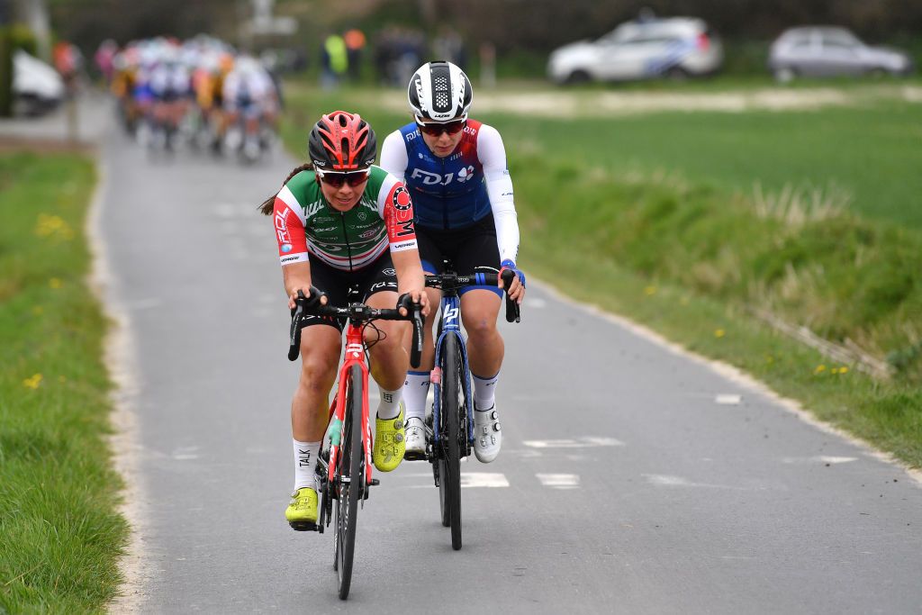 WAREGEM BELGIUM MARCH 30 LR Svenja Betz of Germany and Team Ibct and Victorie Guilman of France and Team FDJ Nouvelle Aquitaine Futuroscope compete in the breakaway during the 10th Dwars door Vlaanderen 2022 Womens Elite a 120km one day race from Waregem to Waregem DDV22 DDVwomen on March 30 2022 in Waregem Belgium Photo by Luc ClaessenGetty Images