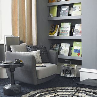 living room with grey wall and sofa