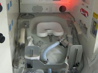 A mock-up of the bathroom on the space shuttle at Johnson Space Center in Texas.
