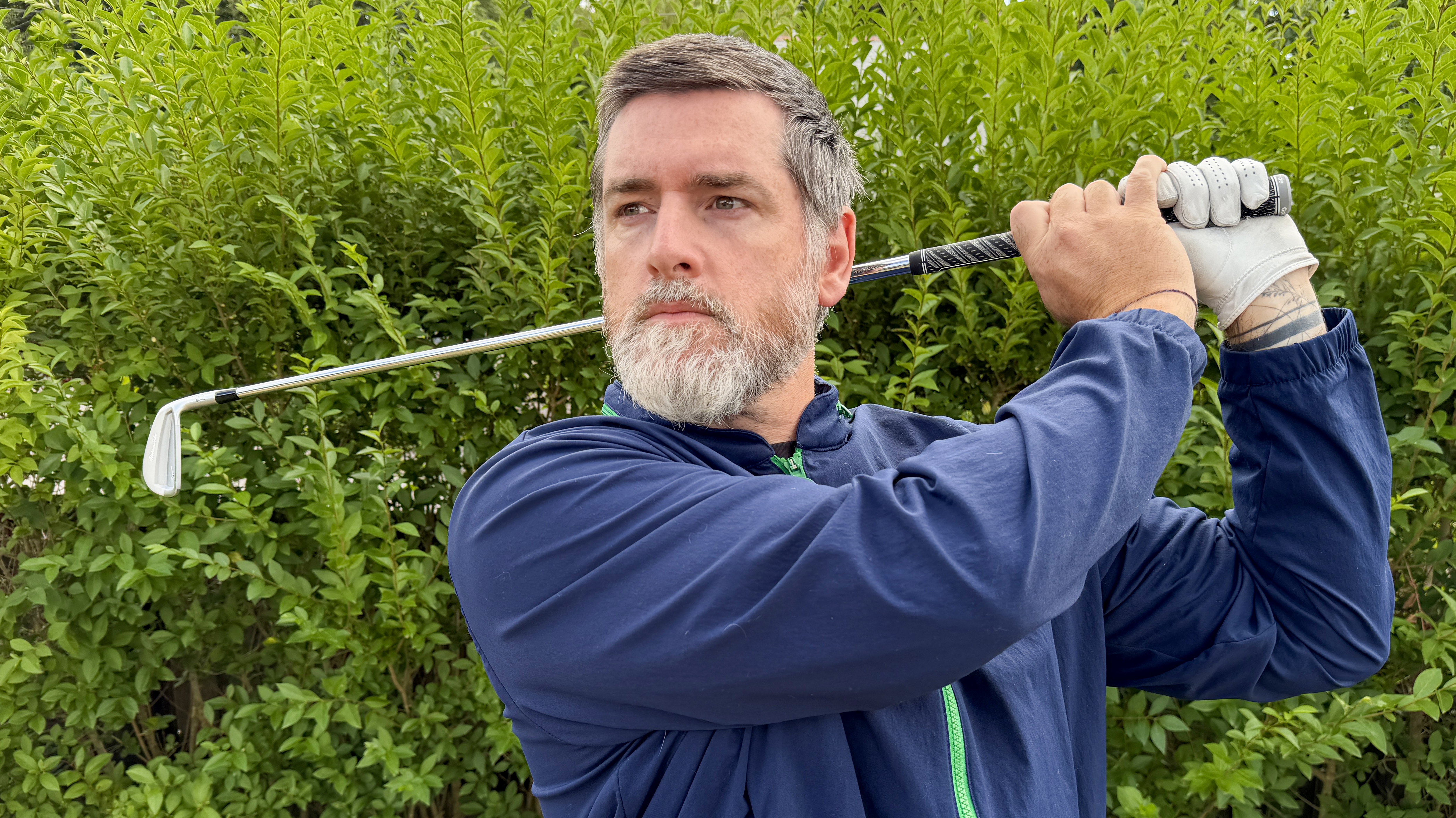 Photo of Joe Ferguson testing the Mizuno Pro-S4 irons