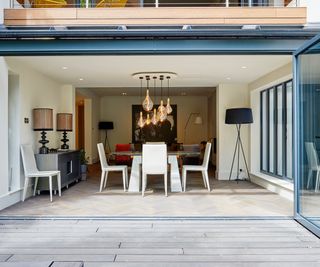 rear extension with large bi-fold doors open and view into dining area