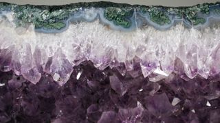 A cross-section of quartz, exposing the amethyst within.