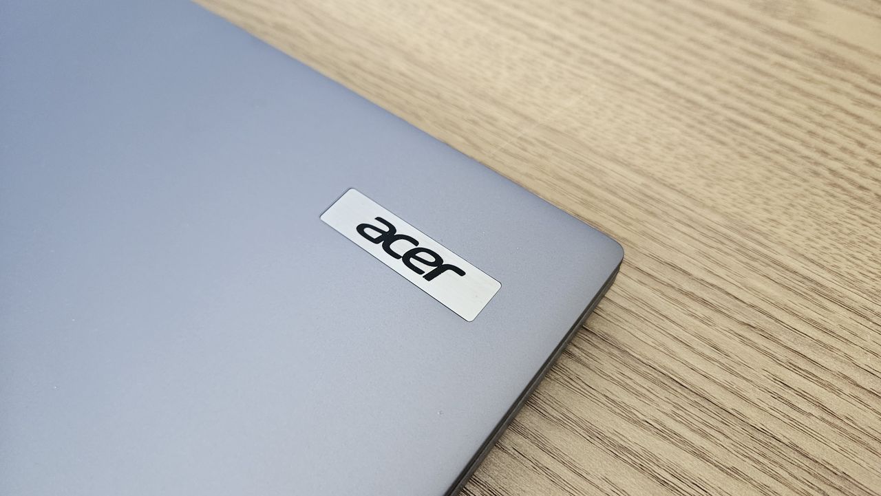 The Acer TravelMate X14 AI on a desk