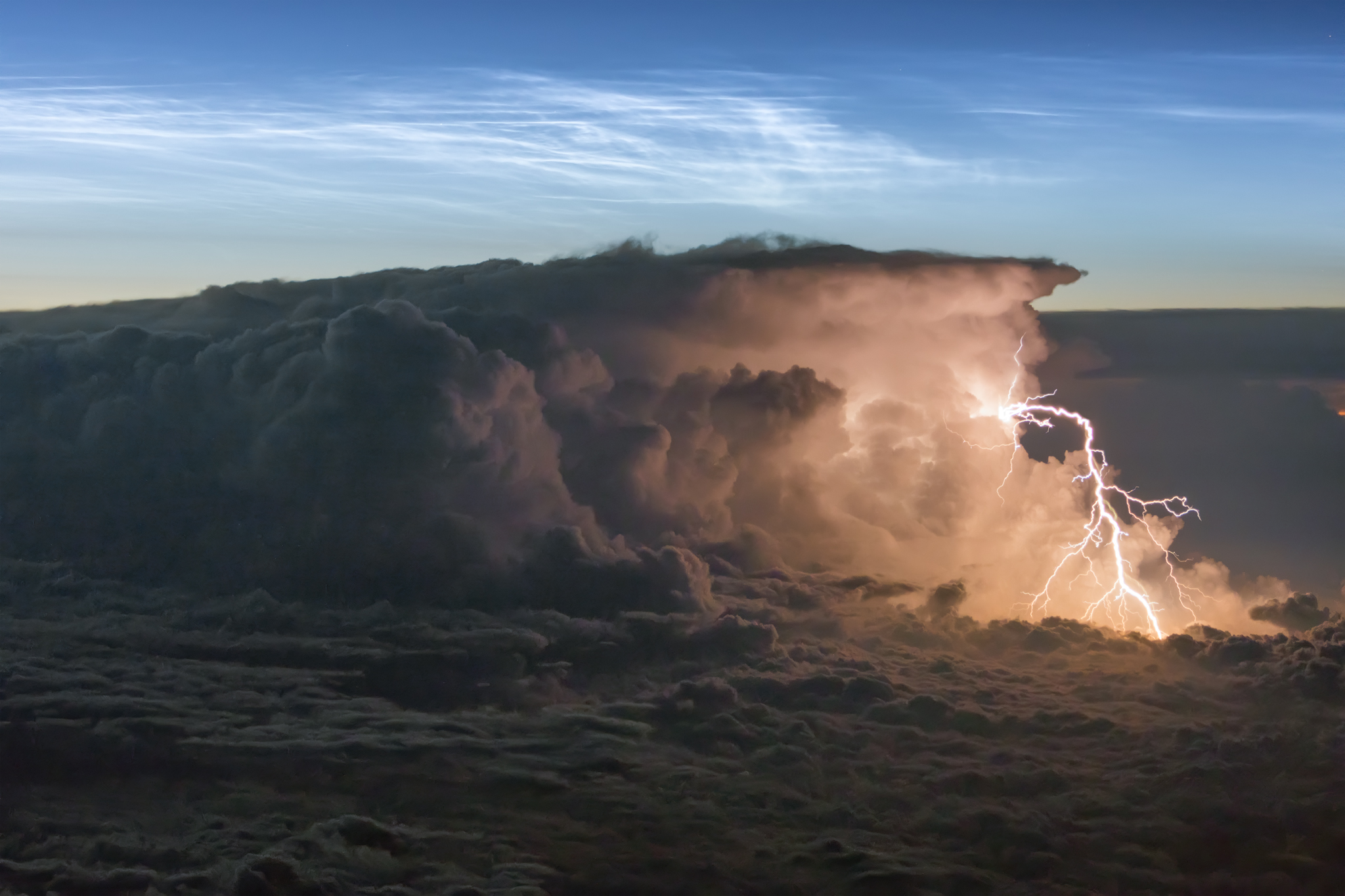 A photograph taken by pilot Ralf Rohner of lightning from above