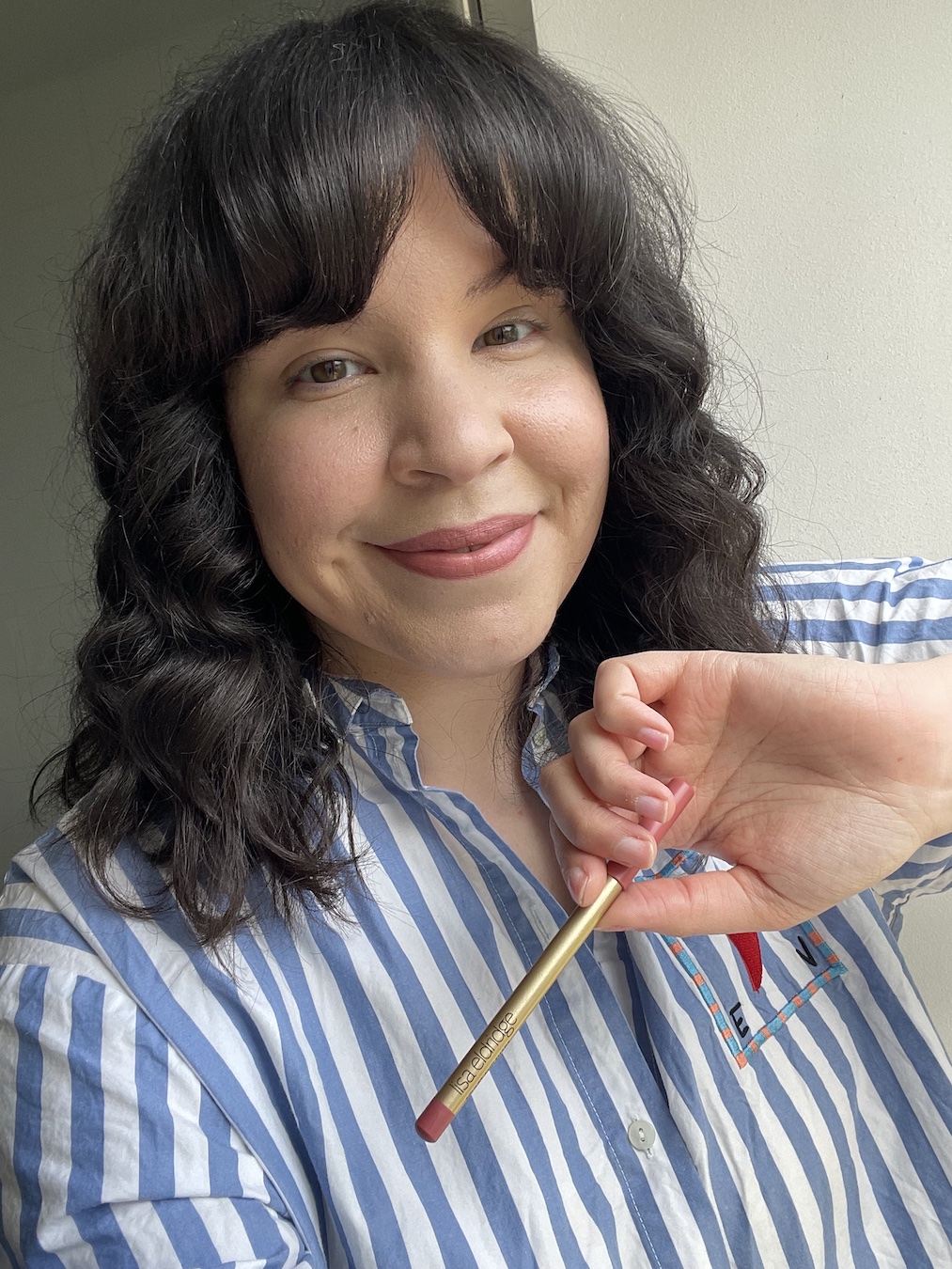 Mica Ricketts wearing Charlotte Tilbury matte revolution lipstick