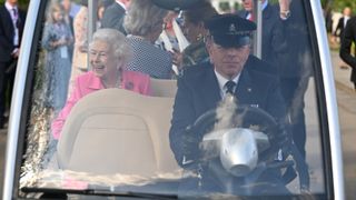 Queen Elizabeth II is given a tour by Keith Weed, President of the Royal Horticultural Society during a visit to The Chelsea Flower Show 2022 at the Royal Hospital Chelsea on May 23, 2022 in London, England