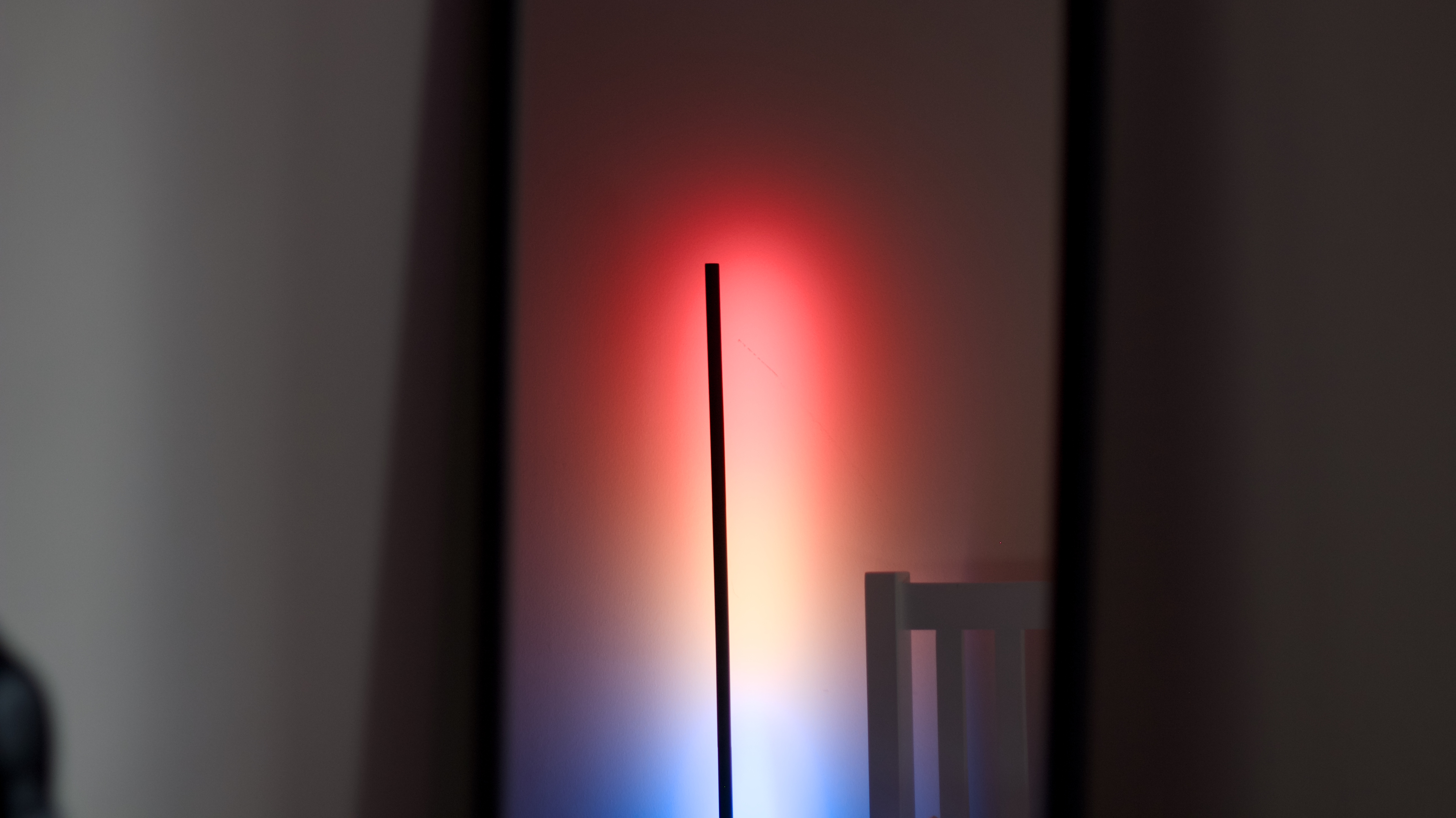 Govee Floor Lamp 2 projecting multicolored light onto wall