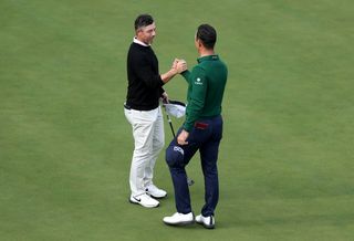 Rory McIlroy and Billy Horschel shake hands on the 18th green