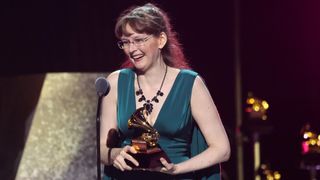 LOS ANGELES, CALIFORNIA - FEBRUARY 02: (FOR EDITORIAL USE ONLY) Winifred Phillips accepts the Best Score Soundtrack for Video Games and Other Interactive Media award for "Wizardry: Proving Grounds of the Mad Overlord" onstage during the 67th GRAMMY Awards Premiere Ceremony at Peacock Theater on February 02, 2025 in Los Angeles, California. (Photo by Amy Sussman/Getty Images)