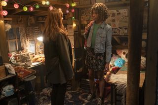 Donna (Catherine Tate) and Rose (Yasmin Finney) stand inside Rose's shed, surrounded by her stuffed toys and her toy-making equipment