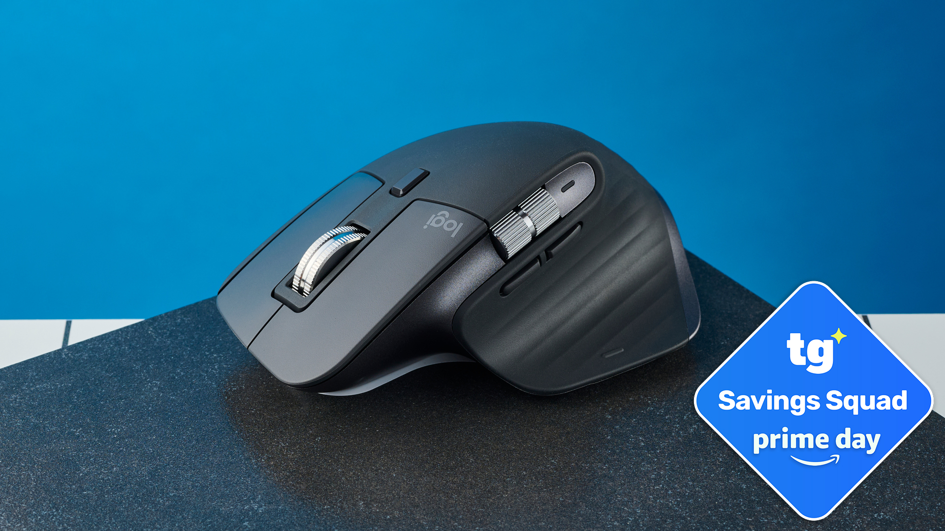 The Logitech MX Master 3S mouse on a stone surface with a blue background